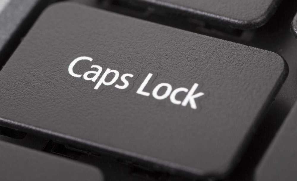 Как отключить caps lock на ноутбуке?